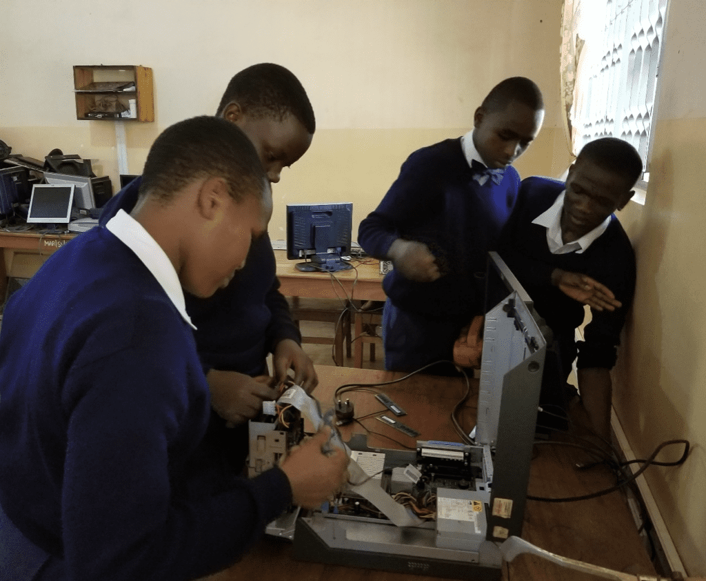 The students get to help out with the maintenance too – here at Maringeni Secondary school in Kilimanjaro – and learn about computers along the way